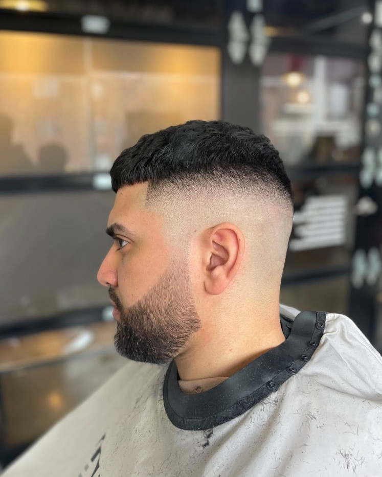 Textured haircut with low taper at KLUTCH NDG Montreal